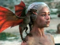 A newborn Drogon with Daenerys Targaryen